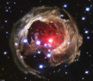 Nasa has released an image of the 'light echo' produced by the glare from a star that was, for one brief shining moment, the brightest in the night sky.  