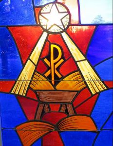 stained glass nativity with sun
